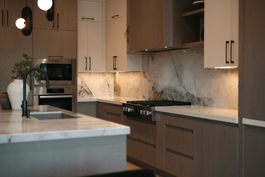 Modern elegant kitchen with marble surfaces