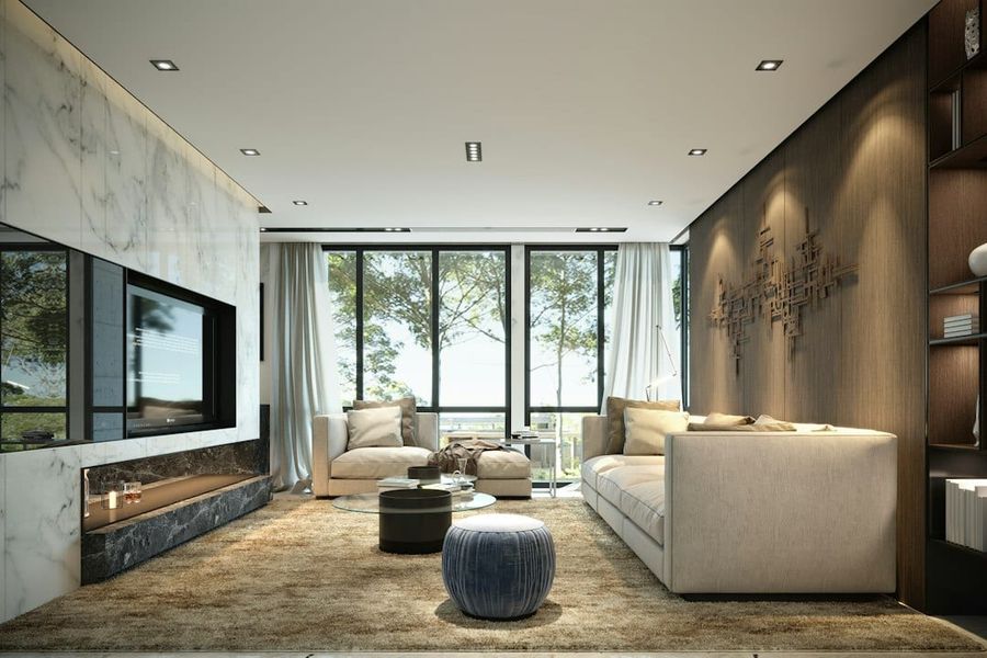 Spacious luxury living room with floor-to-ceiling windows